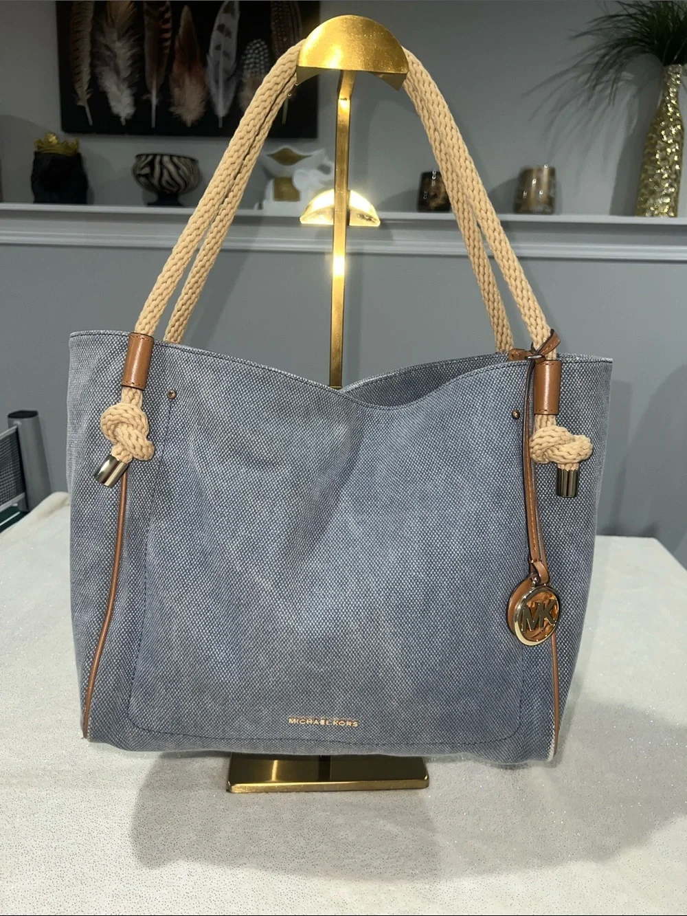 Michael Kors Isla Large Tote Bag, washed denim with signature rope handles.